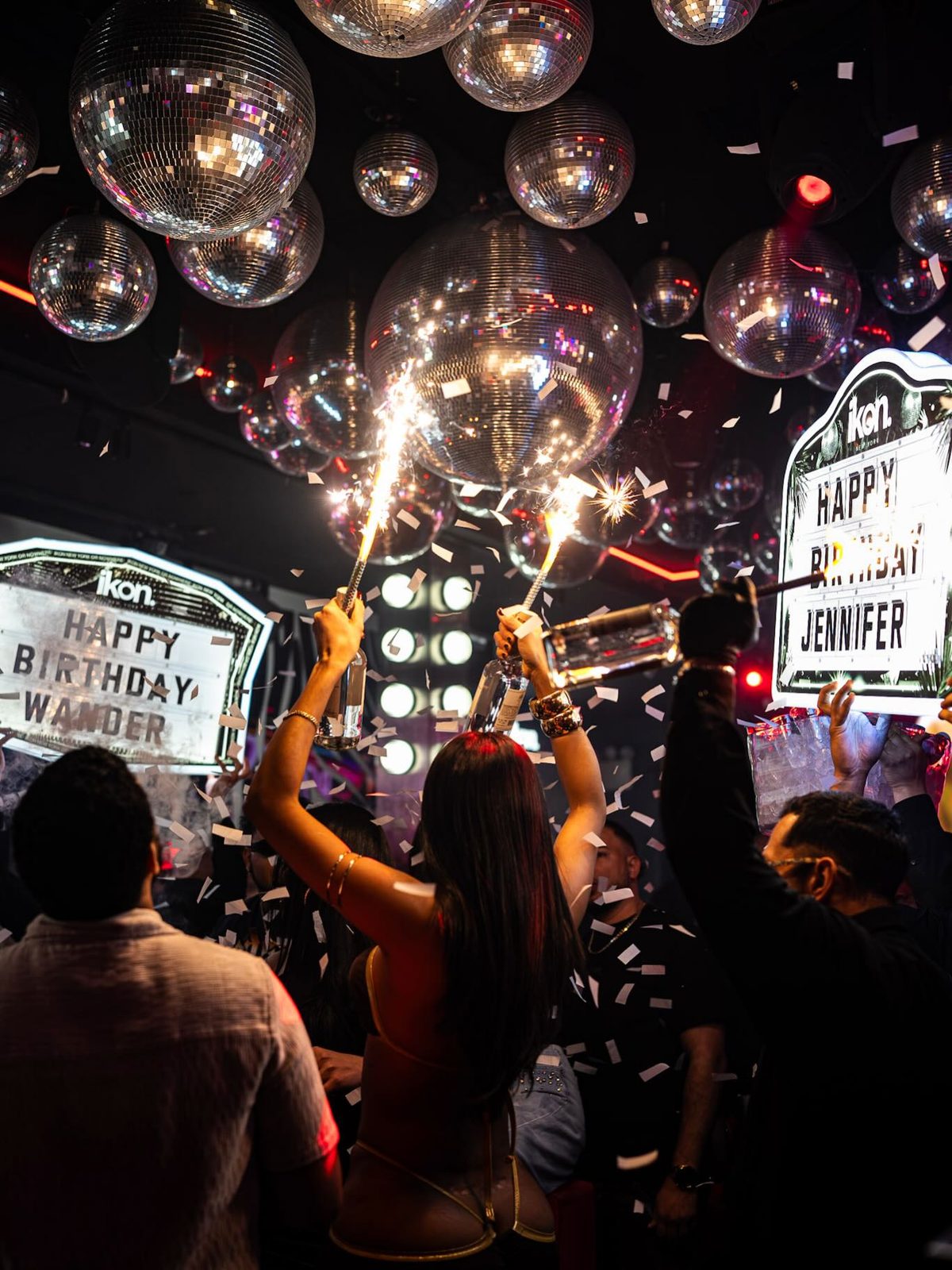 A birthday table with sparklers and marquee letters at IKON