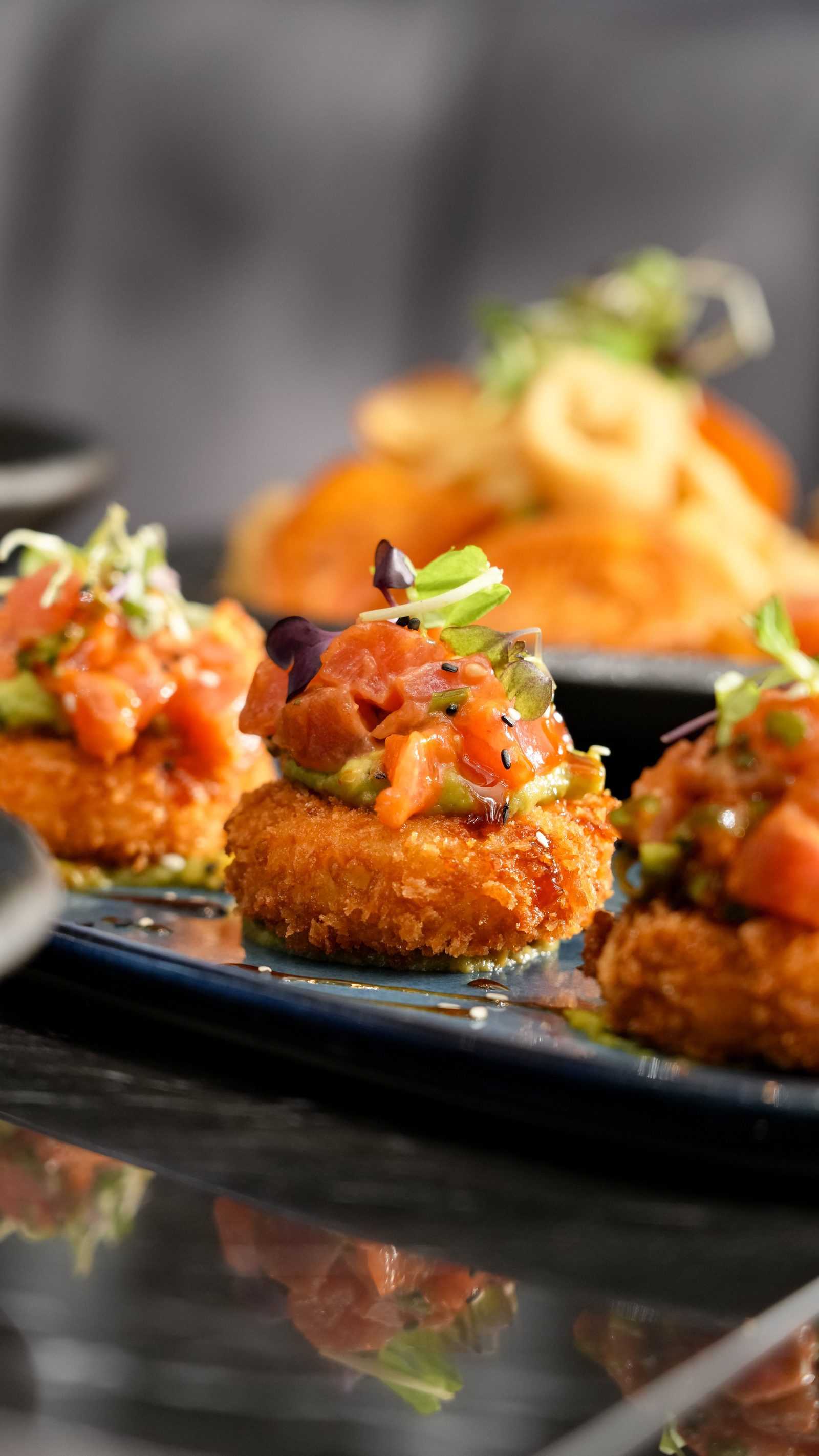 Crispy rice tartare topped with tuna and avocado
