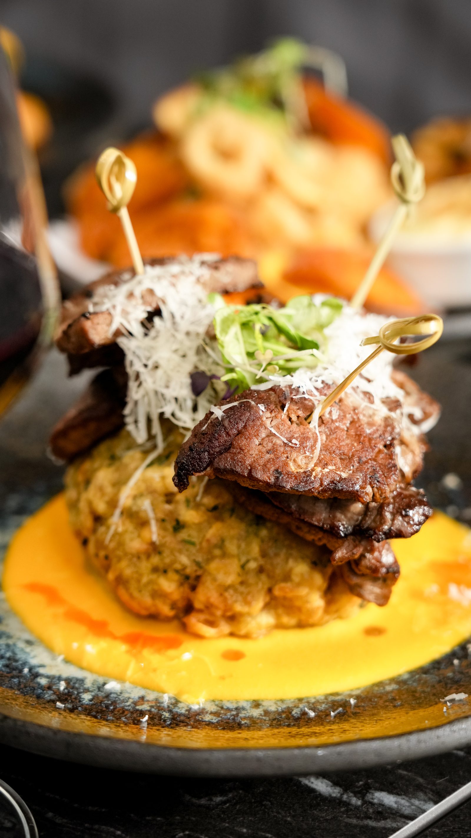 Mofongo topped with steak and huancaina sauce
