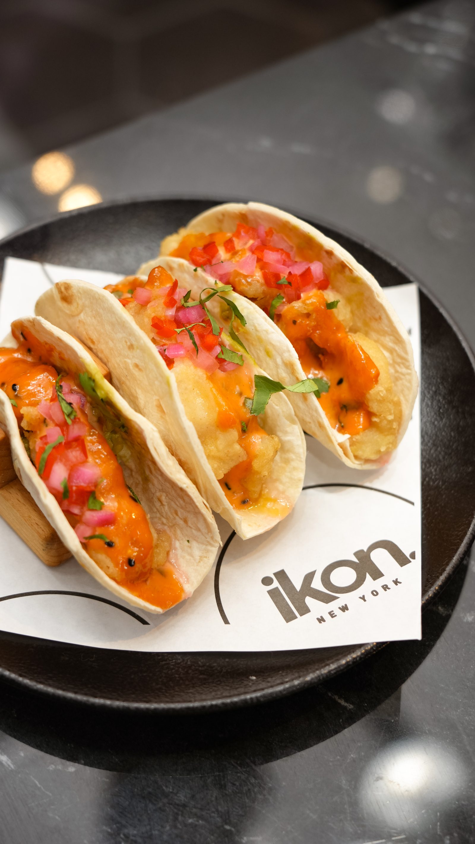 Tacos served on IKON branded paper